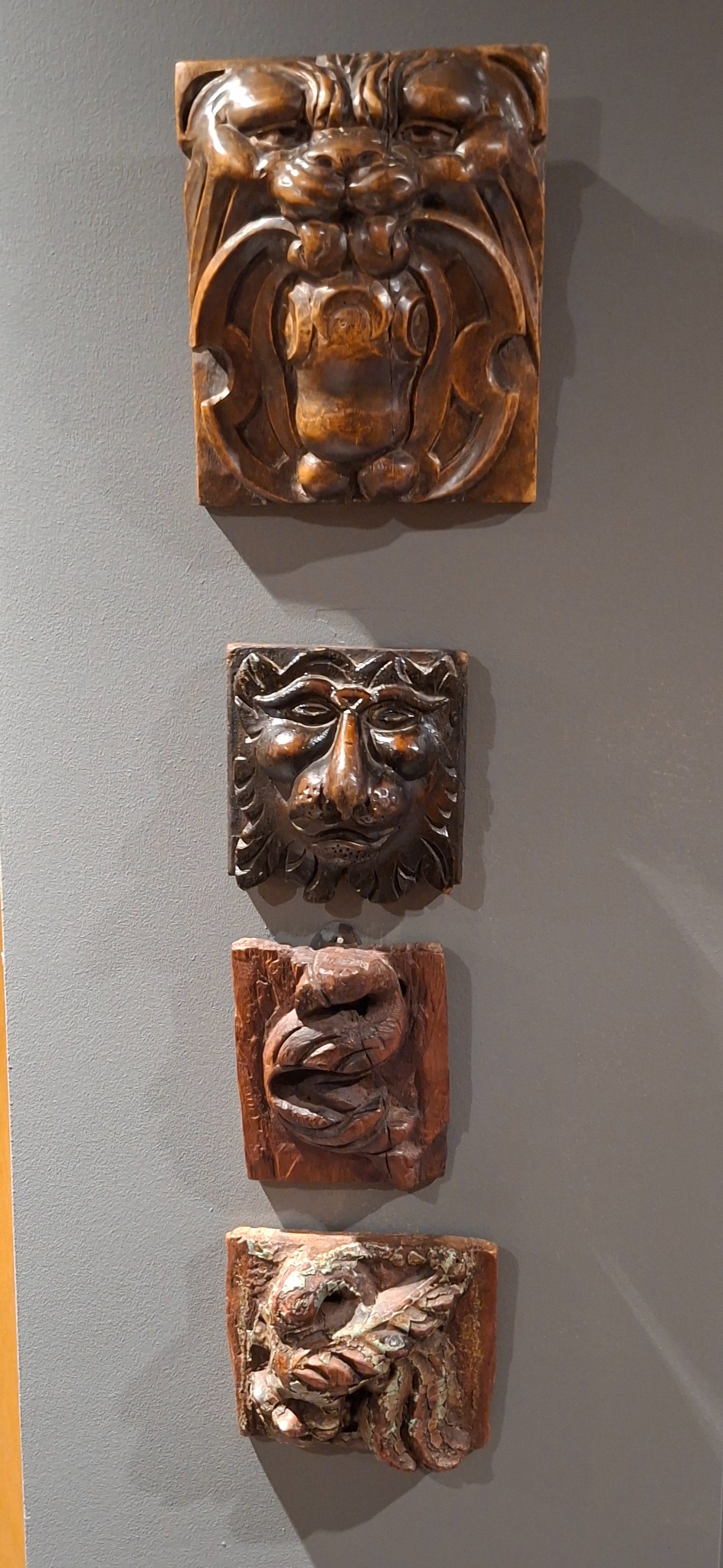 A collection of carved faces