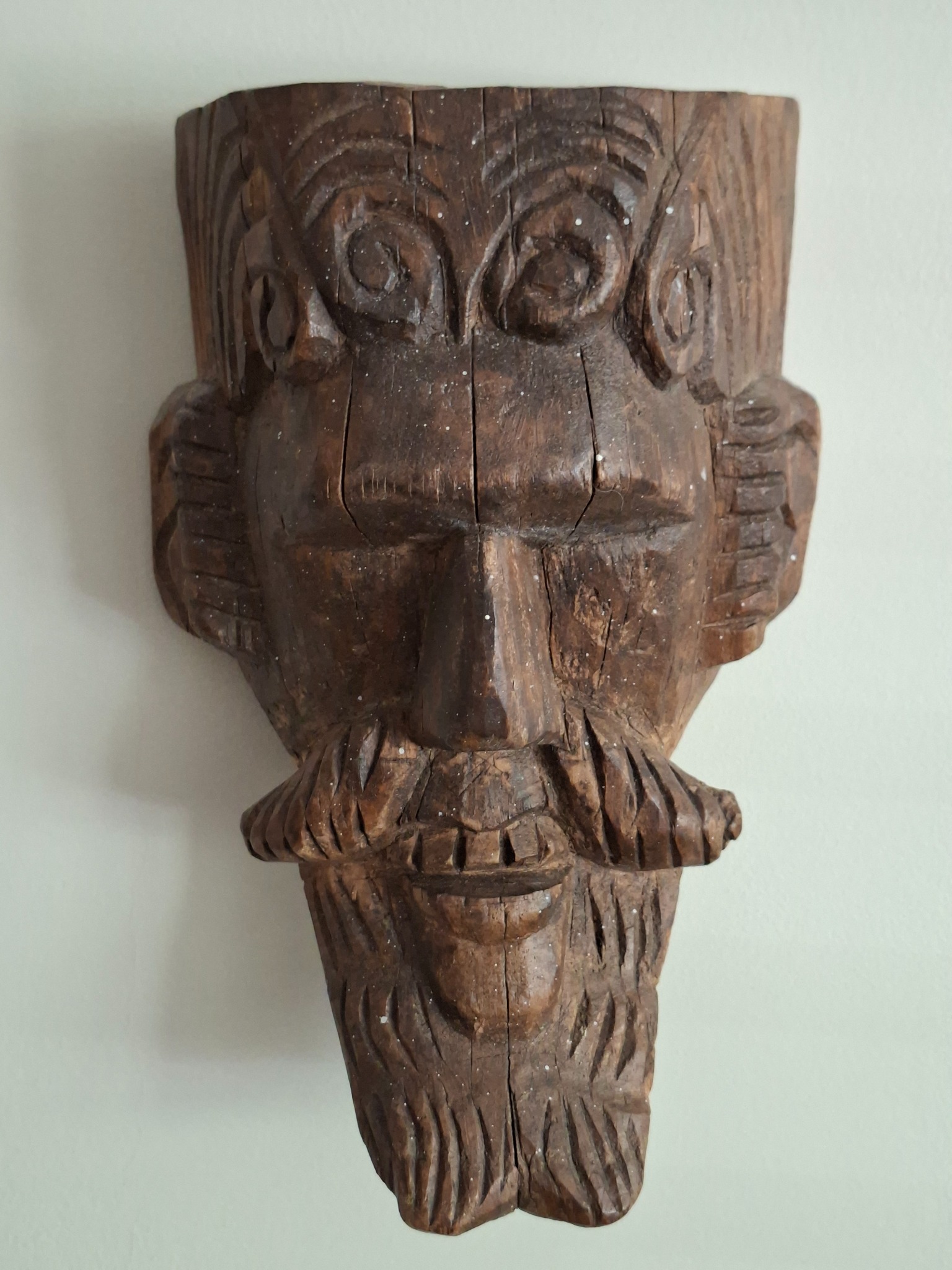 A characterful carved wooden owl