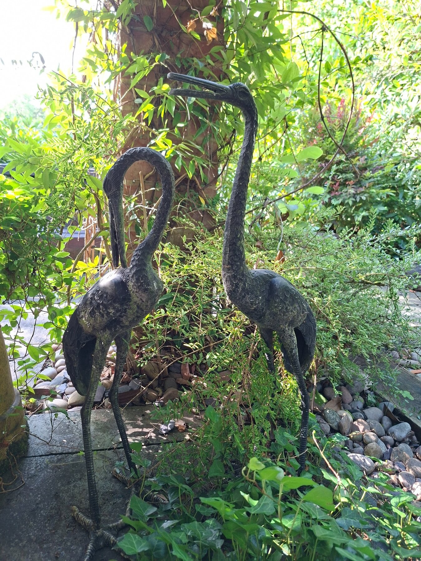 Metal birds in the garden