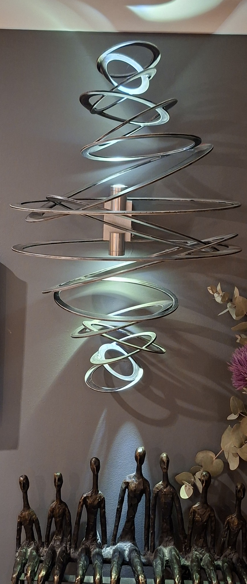 Matching handmade Italian sculptural wall light at Havisham House